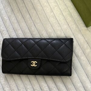 CHANEL Black Quilted Wallet with Gold Logo